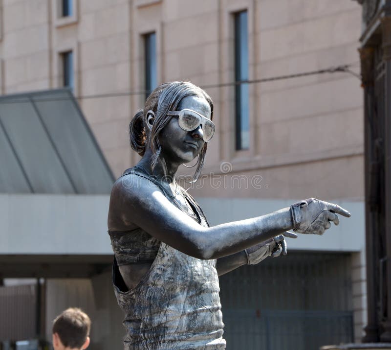 Silver girl. Living sculpture royalty free stock image Silver girl. Living sculpture royalty free stock image