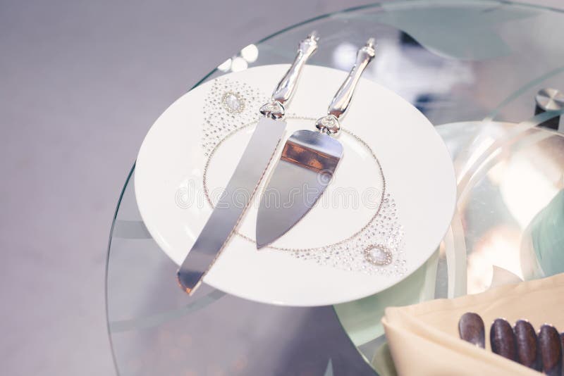 Silver Knife and Spatula for Cutting Wedding Cake Stock Photo Image