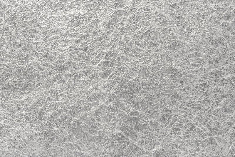 Silver Leaf Foil Background with Shiny Crumpled Uneven Surface for