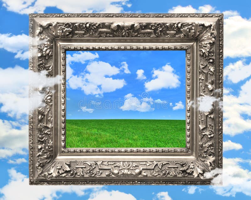 Silver picture frame against a blue sky stock image Silver picture frame against a blue sky stock image