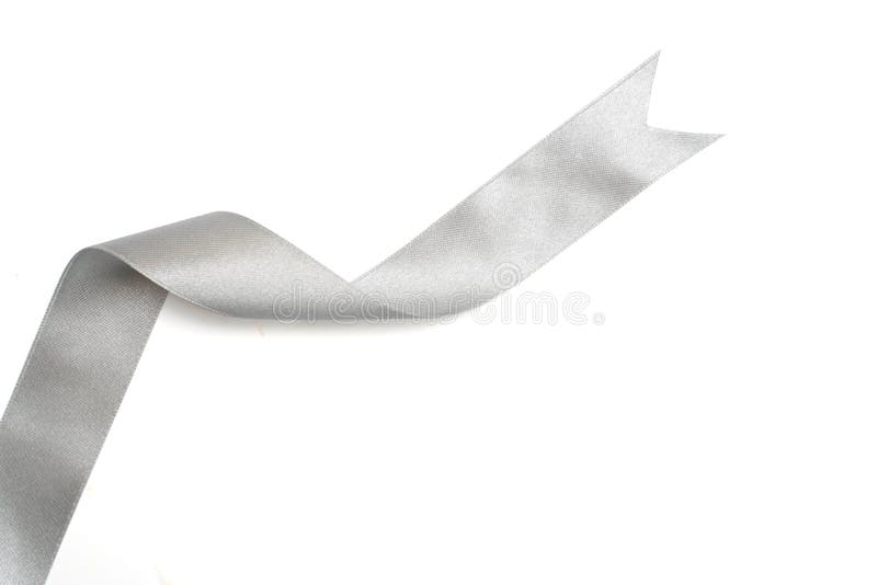 cream ribbon in roll on white Stock Photo