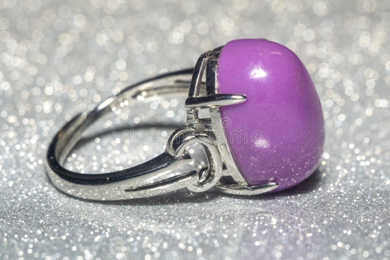 Silver ring with purple stone