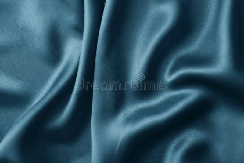 Soft folds of blue silk cloth texture., Stock image