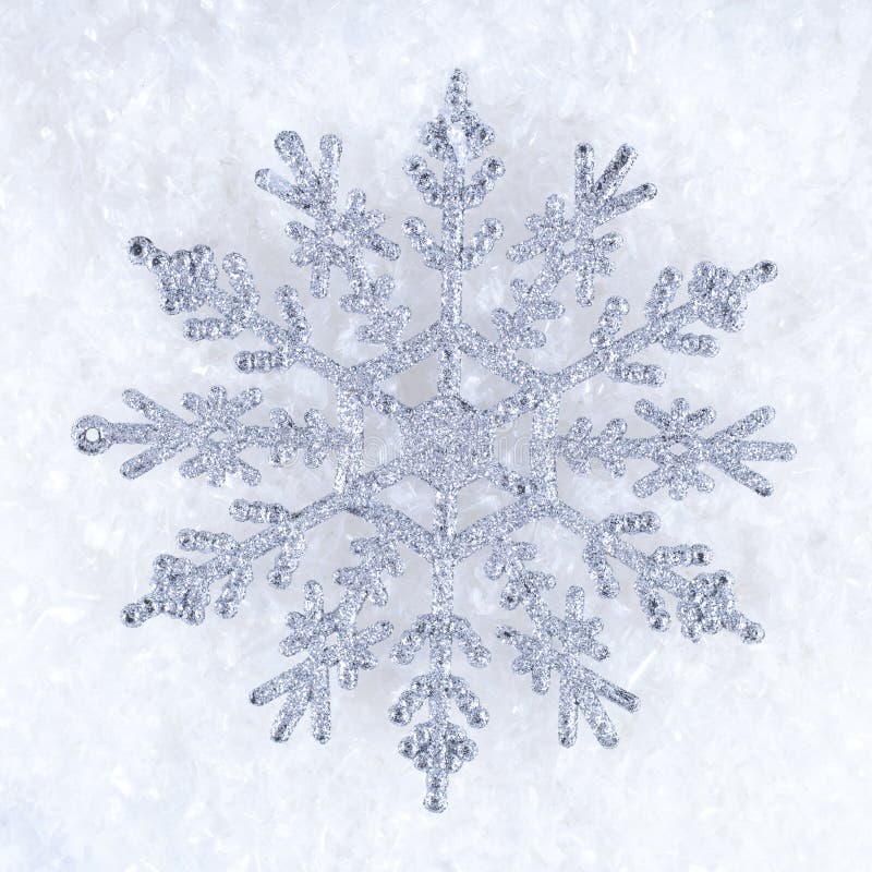 Silver snowflake royalty free stock photos