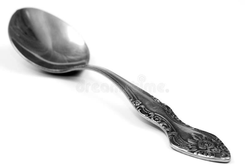 Silver antique spoons on white background. Silver antique spoons on white background
