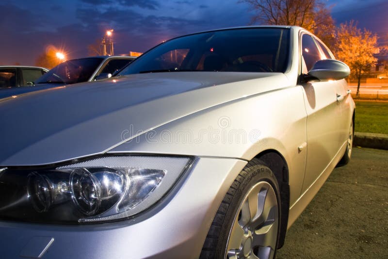 New silver sports car in the evening