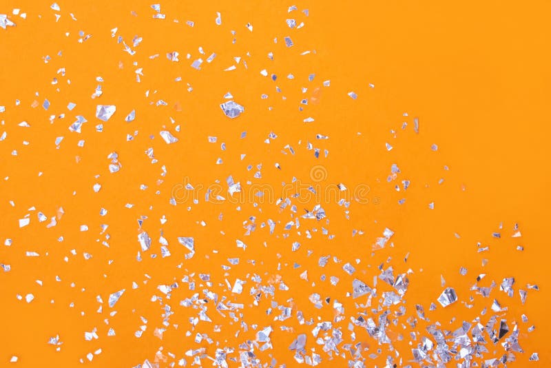 Beautiful Orange Background With Silver Glitter Stars Stock Photo