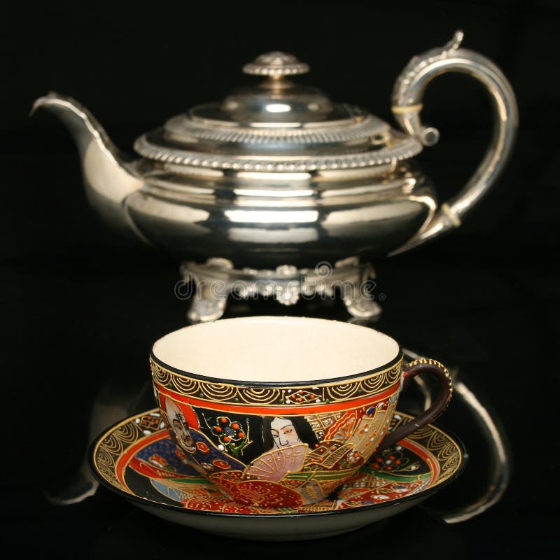 Silver Teapot and an Antique Chinese Cup of Tea Stock Photo Image of