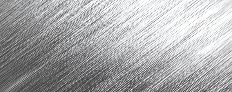 A silver textured surface with a fine, crosshatched pattern, creating a sophisticated, linear stock photos