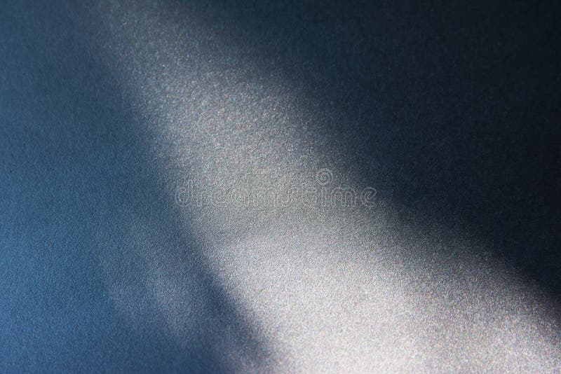 Silver textured under the shade with blue gradient. Silver texture with shadow texture background. Dark silver texture royalty free stock images