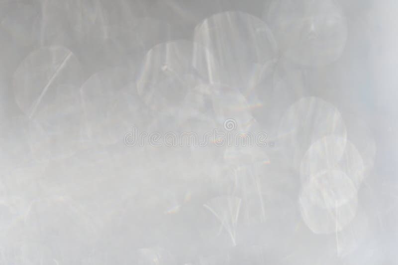 Silver White Gray bokeh background. Abstract sparkles particle moving small large defocus different overlay blend screen modes stock image