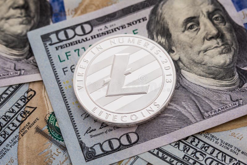 SilverLitecoin mynt på dollarsedelbakgrund Affärs- och teknologibegrepp Litecoin Co för metall för Digital valuta fysisk royaltyfri foto SilverLitecoin mynt på dollarsedelbakgrund Affärs- och teknologibegrepp Litecoin Co för metall för Digital valuta fysisk royaltyfri foto