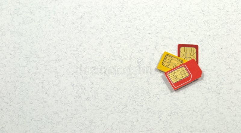 Три цветные SIM-карты стоковые изображения
