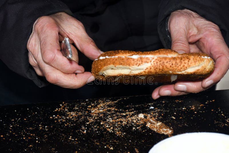 Simit Is A Turkish Loop Shaped Bread Encrusted With Sesame Seeds Simit Is A Turkish Loop Shaped Bread Encrusted With Sesame Seeds
