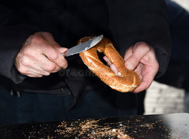 Simit Is A Turkish Loop Shaped Bread Encrusted With Sesame Seeds Simit Is A Turkish Loop Shaped Bread Encrusted With Sesame Seeds