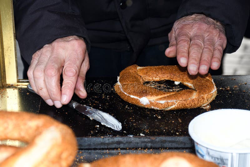 Simit Is A Turkish Loop Shaped Bread Encrusted With Sesame Seeds Simit Is A Turkish Loop Shaped Bread Encrusted With Sesame Seeds