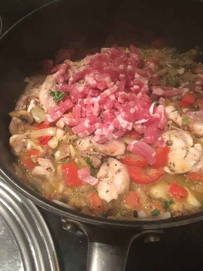 Mushrooms And Parsley Simmering In A Poele Stock Image Image of
