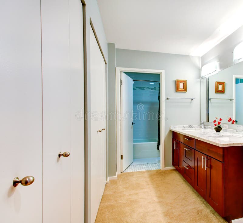 Simple Bathroom Interior with Vanity and Mirror Stock Image