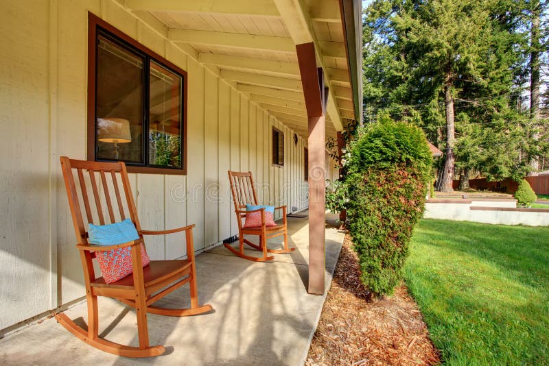 Simple Little Front Porch with Two Rocking Chairs. Stock Photo Image