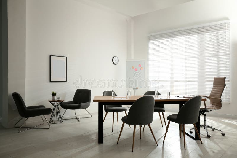 Simple Office with Large Table and Chairs Stock Image - Image of design