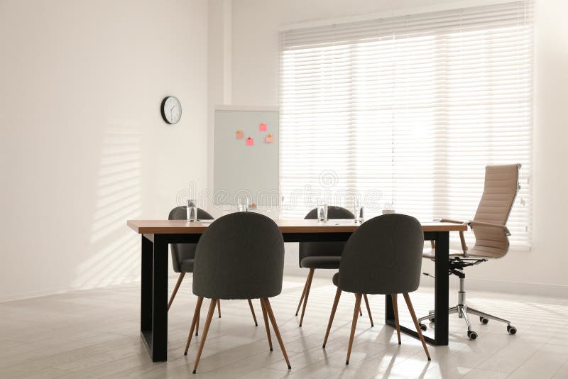 Simple Office Interior with Table and Chairs Stock Photo - Image of