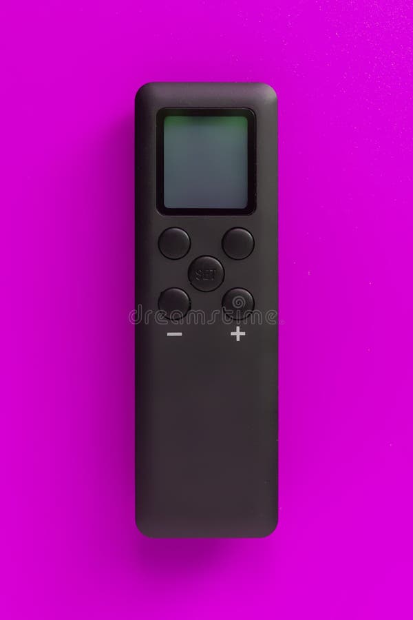 Simple remote wireless controlle on the color background isolated top view
