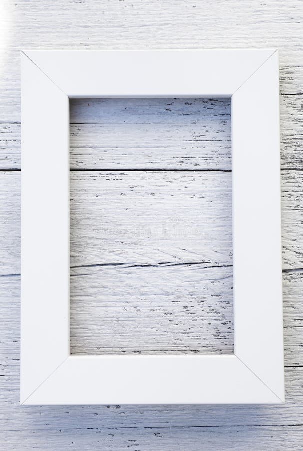 Simple rustic white frame and textured background stock photography