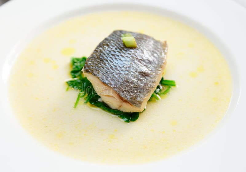 Simple but tasty piece of steamed seabass fillet stock photos