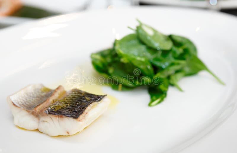 Simple but tasty piece of steamed seabass fillet royalty free stock image