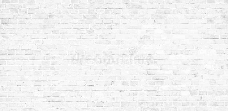 Simple white brick wall with light gray shades seamless pattern surface texture background in banner wide panorama