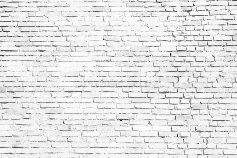 Simple white and grey brick wall as seamless pattern texture background