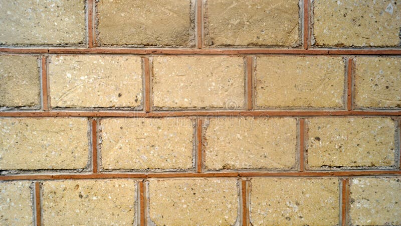 Simulated Sand Color Bricks Divided By Ochre Stripes Wall Texture