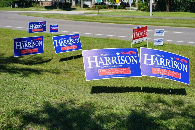 Sinal azul do voto da eleição que vota o distrito 63 da casa do estado do abeto de Shawn Harrison imagem de stock Sinal azul do voto da eleição que vota o distrito 63 da casa do estado do abeto de Shawn Harrison imagem de stock