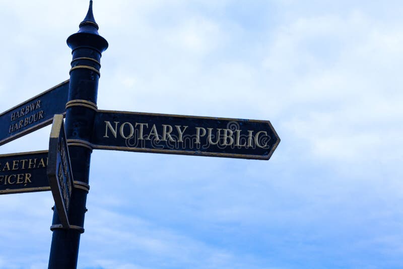Text sign showing Notary Public. Business photo text Legality Documentation Authorization Certification Contract Road sign on the crossroads with blue cloudy sky in the background. Text sign showing Notary Public. Business photo text Legality Documentation Authorization Certification Contract Road sign on the crossroads with blue cloudy sky in the background