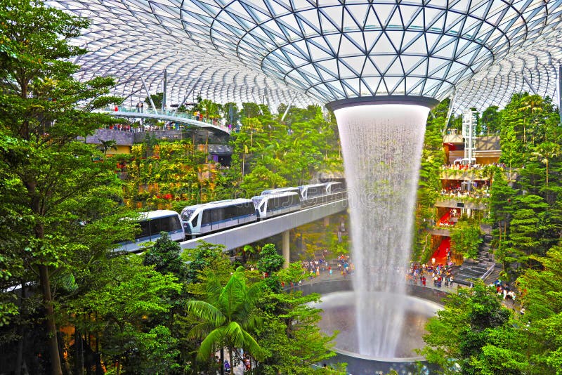 Airport Scene Of Terminal 3 Of Changi Airport In Singapore - Travellers  Relaxing And Waiting For Check-in Stock Photo, Picture and Royalty Free  Image. Image 14041517.