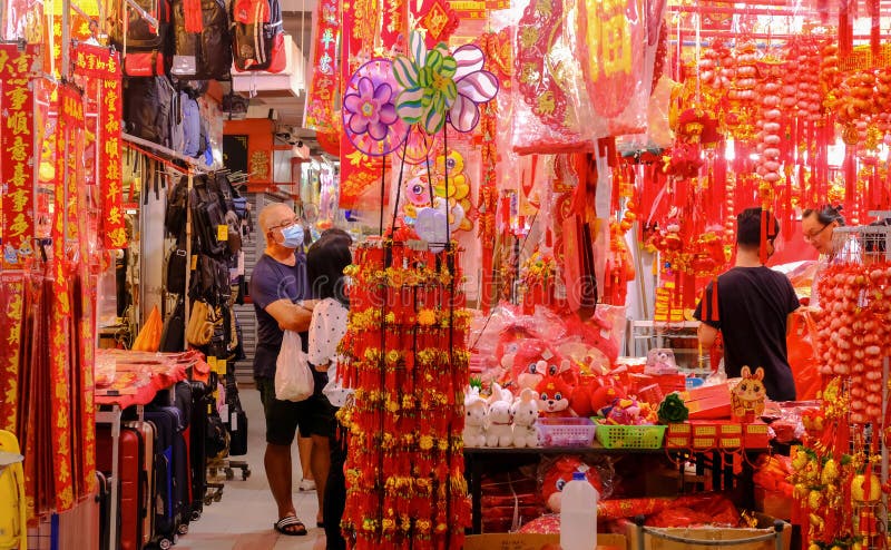 Singapore, Jan 1 2023 - Locals shopping for Chinese New Year ornaments home decoration in Chinatown night market _. Singapore, Jan 1 2023 - Locals shopping for Chinese New Year ornaments home decoration in Chinatown night market _