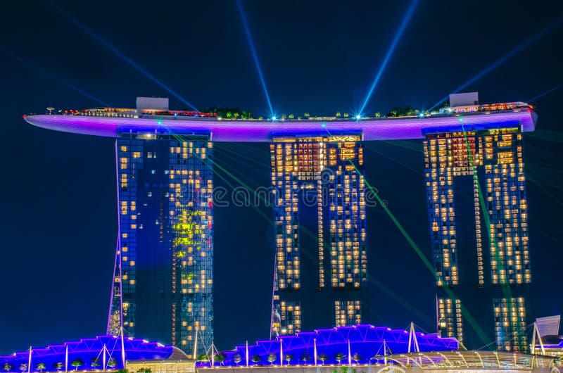 Beautiful laser show at Marina Bay Sands Hotel in night time is most popular for tourist and landmark center of Singapore stock photography Beautiful laser show at Marina Bay Sands Hotel in night time is most popular for tourist and landmark center of Singapore stock photography