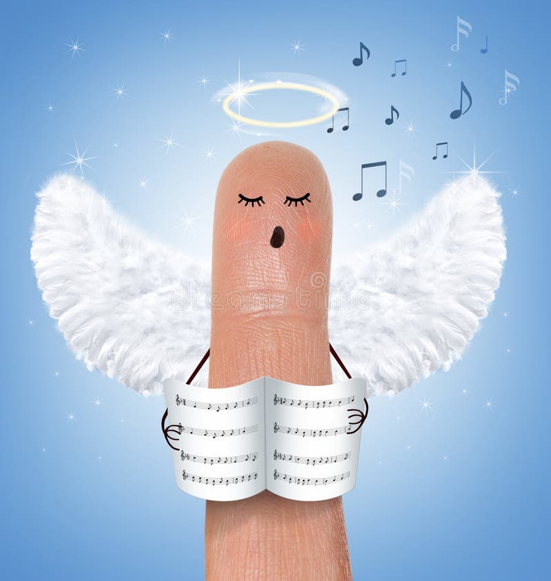 Singing angel on finger royalty free stock photo Singing angel on finger royalty free stock photo