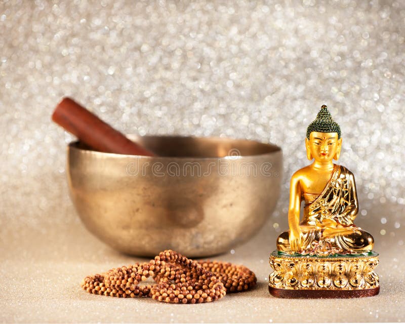 Singing Bowl and Buddha Statue. Stock Photo Image of worship