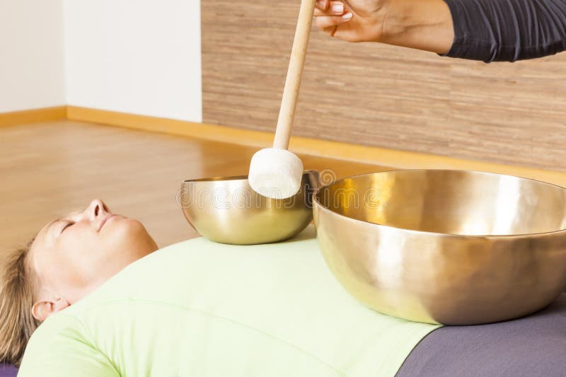 Woman at Wellness Massage with Singing Bowls Stock Photo Image of massaging, cymbal 26868974