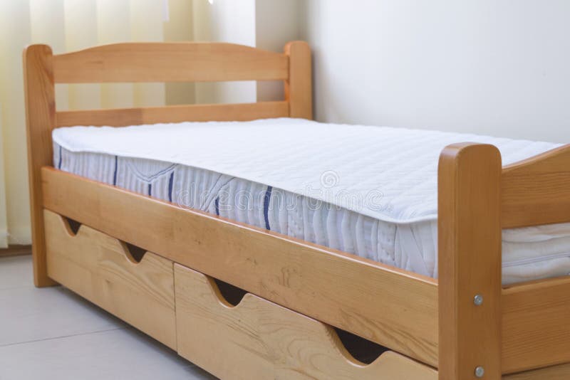 Single bed with drawers stock image. Image of hotel 237062599