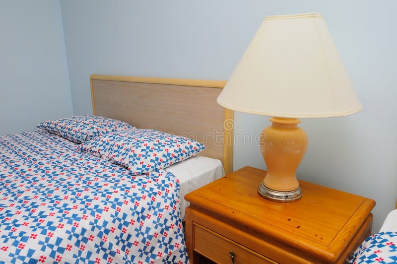 Single bed with lamp