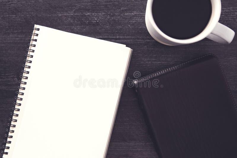 Top view of an empty notebook, scrapbook accessories and a cup of coffee on  a black background. 34225260 Stock Photo at Vecteezy