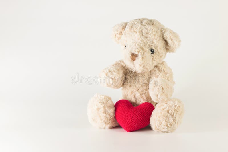 Single Brown Teddy Bear with Red Heart Yarn. Stock Image Image of