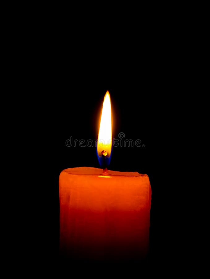 A Single Burning Candle Isolated on Black Stock Photo Image of