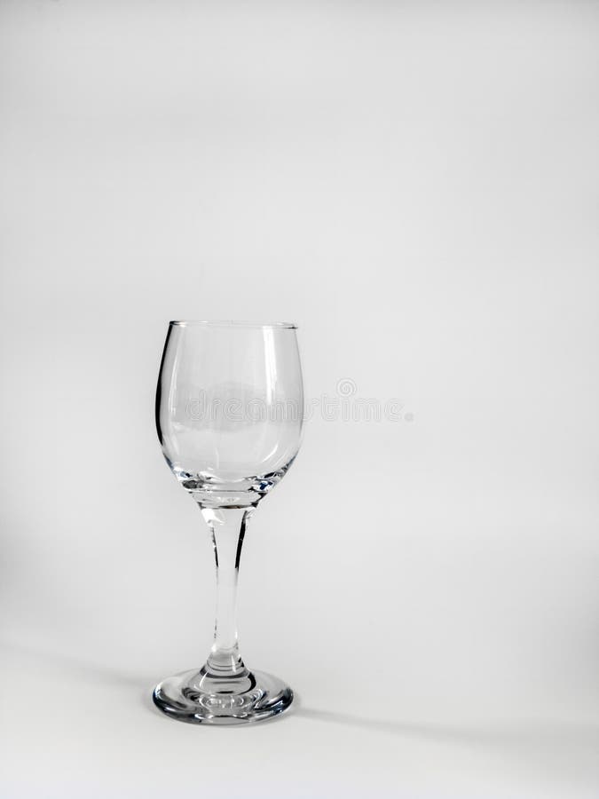 Clear wine glass on white stock image. Image of minimalist 180434975