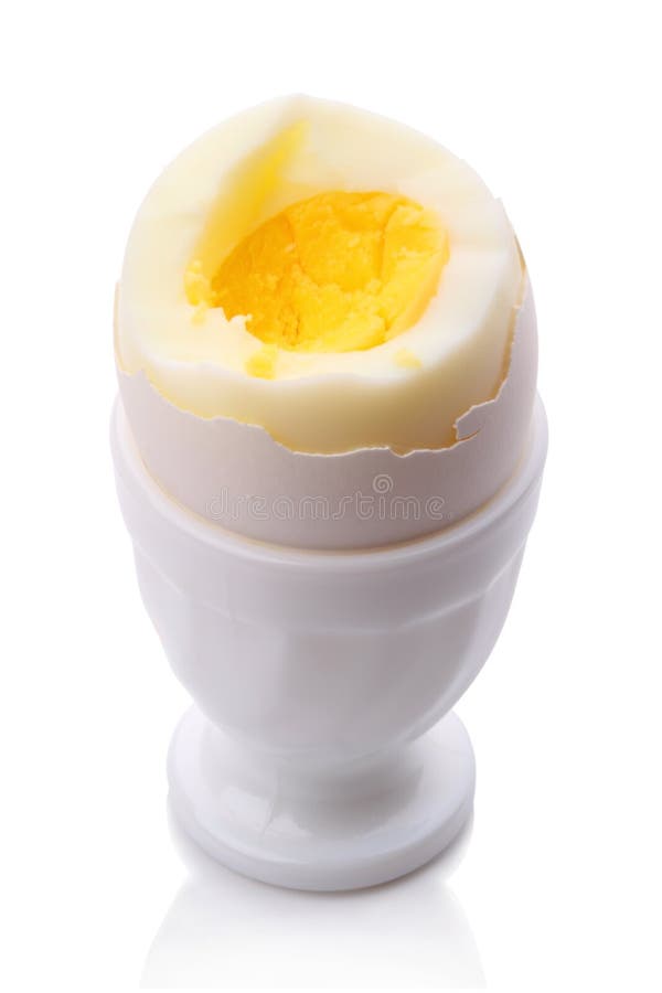 Single egg in cup on white stock photo. Image of whites 18882274