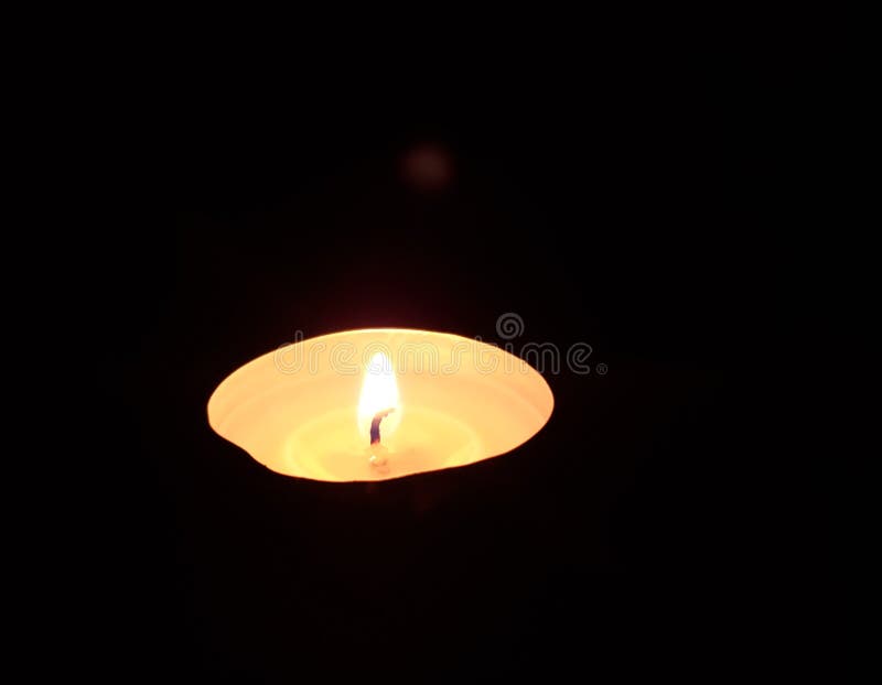 A Flame in the Dark stock image. Image of dark, candlelight 142846075