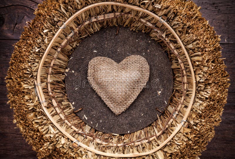 A single heart inside a basket royalty free stock images