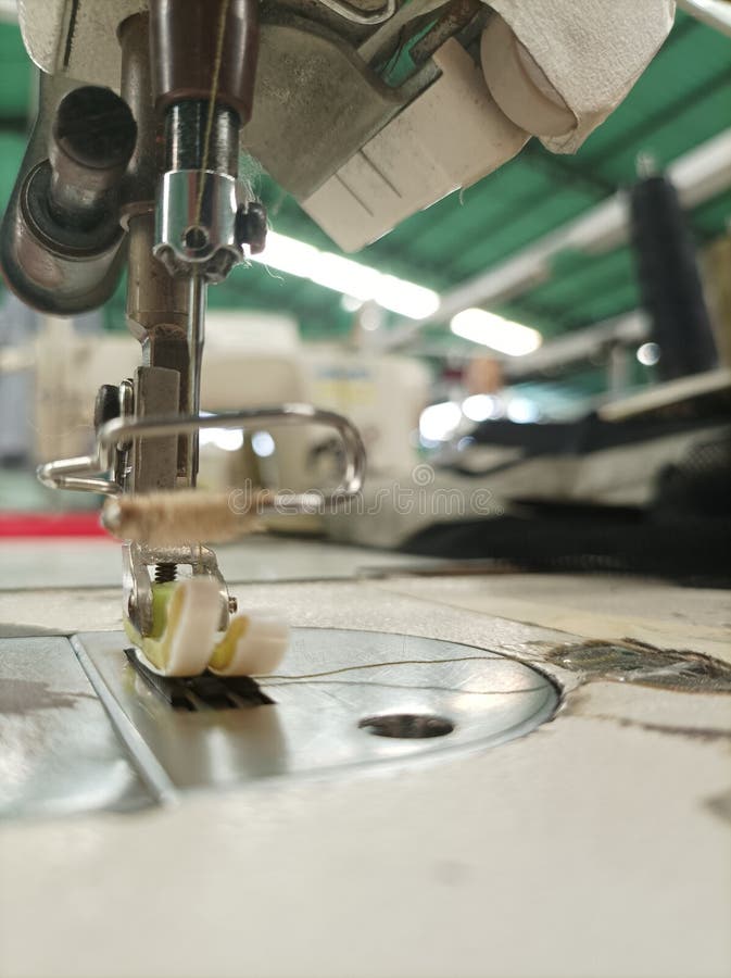 This is a Single Needle Sewing Machine Equipped with a Needle Guard